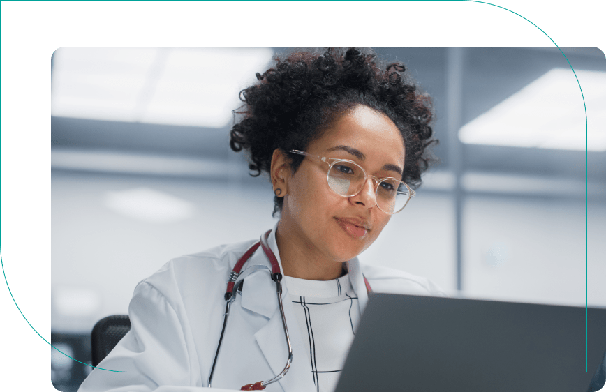 Doctor looking at laptop screen